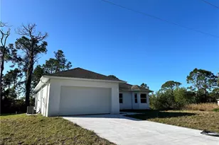 718 Chattman St E, Lehigh Acres, FL 33974 - Photo 1