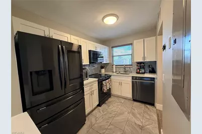 160 Turtle Lake Ct #303, Naples, FL 34105 - Photo 1