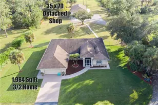 60 25th Ave NW, Naples, FL 34120 - Photo 1