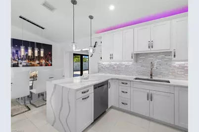 1837 51st Ter SW, Naples, FL 34116 - Photo 8