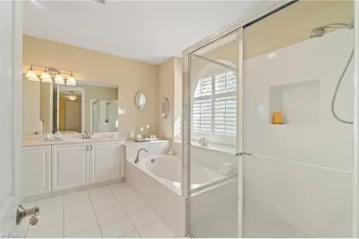 1879 Ivory Cane Pt, Naples, FL 34119 - Photo 32