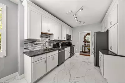 8310 Big Acorn Cir #1002, Naples, FL 34119 - Photo 14