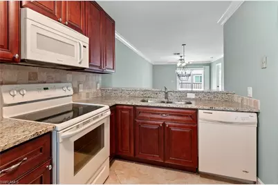 829 W Elkcam Cir #2-208, Marco Island, FL 34145 - Photo 2