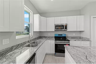 1307 NW Juanita Pl, Cape Coral, FL 33993 - Photo 8