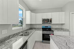 1307 NW Juanita Pl, Cape Coral, FL 33993 - Photo 8