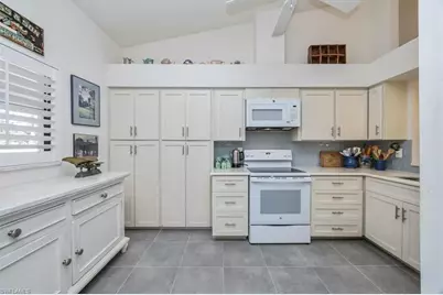 501 Lake Louise Cir #204, Naples, FL 34110 - Photo 4