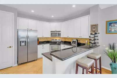 1407 Santiago Cir #1303, Naples, FL 34113 - Photo 8