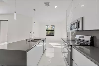 618 Raintree St E, Lehigh Acres, FL 33974 - Photo 18