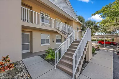 186 Pebble Shores Dr #203, Naples, FL 34110 - Photo 1