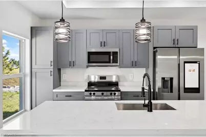 1047 Kirkwood St, Lehigh Acres, FL 33974 - Photo 4