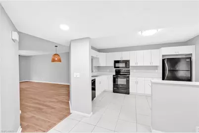 7791 Esmeralda Way #L103, Naples, FL 34109 - Photo 12