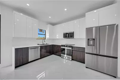 704 Holmes Ave, Lehigh Acres, FL 33974 - Photo 1