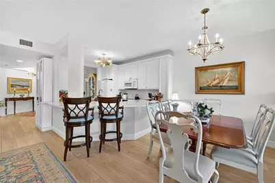 7687 Pebble Creek Cir #303, Naples, FL 34108 - Photo 4