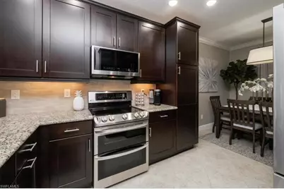 15114 Palmer Lake Cir #104, Naples, FL 34109 - Photo 18