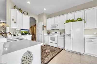 2673 Fishtail Palm Ct, Naples, FL 34120 - Photo 12