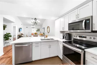 4945 Cougar Ct S #4-202, Naples, FL 34109 - Photo 6