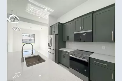 2905 3rd St W, Lehigh Acres, FL 33971 - Photo 4