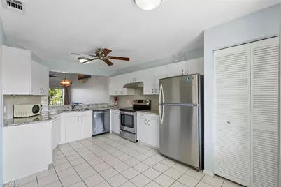 121 Gabriel Cir #1-108, Naples, FL 34104 - Photo 6