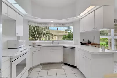 11672 Quail Village Way #130-3, Naples, FL 34119 - Photo 8