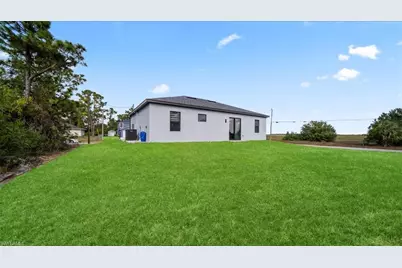 1256 Edmund St E, Lehigh Acres, FL 33974 - Photo 30
