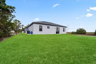 1256 Edmund St E, Lehigh Acres, FL 33974 - Photo 30