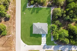 1256 Edmund St E, Lehigh Acres, FL 33974 - Photo 34