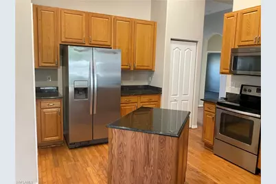 135 Glen Eagle Cir, Naples, FL 34104 - Photo 1