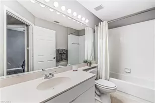 24827 Lakemont Cove Ln, Bonita Springs, FL 34134 - Photo 14