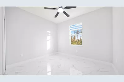 311 Mangonia Ave, Lehigh Acres, FL 33974 - Photo 12