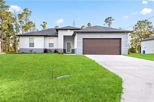 311 Mangonia Ave, Lehigh Acres, FL 33974 - Photo 1