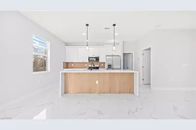 311 Mangonia Ave, Lehigh Acres, FL 33974 - Photo 4