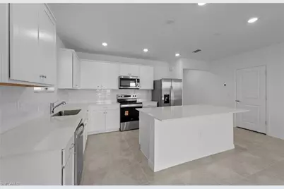 242 Silent Lake Dr, Lehigh Acres, FL 33936 - Photo 4