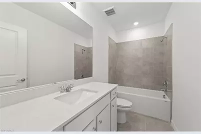 290 Silent Lake Dr, Lehigh Acres, FL 33936 - Photo 18