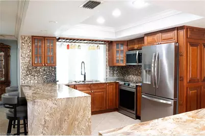233 Baltusrol Dr, Naples, FL 34113 - Photo 8
