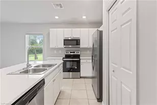 15245 Wildflower Cir, Naples, FL 34104 - Photo 8