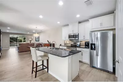 14883 Edgewater Cir, Naples, FL 34114 - Photo 6