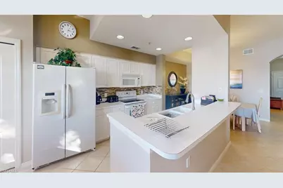 2730 Cypress Trace Cir #2828, Naples, FL 34119 - Photo 18