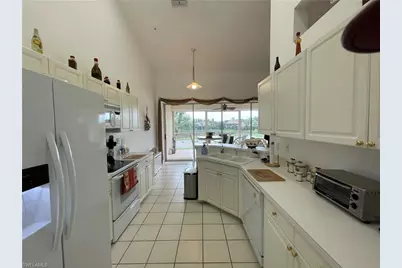 25232 Pelican Creek Cir #202, Bonita Springs, FL 34134 - Photo 6