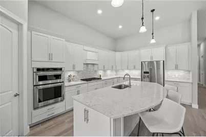 7716 Winding Cypress Dr, Naples, FL 34114 - Photo 4