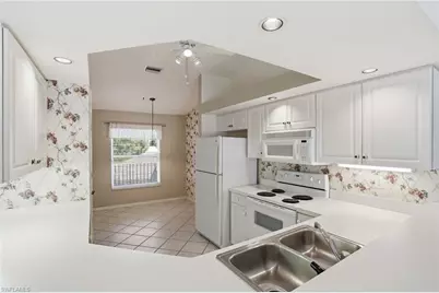 1032 Manor Lake Dr #D204, Naples, FL 34110 - Photo 6