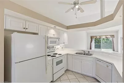 1032 Manor Lake Dr #D204, Naples, FL 34110 - Photo 4