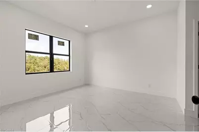 540 Lone Star Ln, Lehigh Acres, FL 33974 - Photo 26