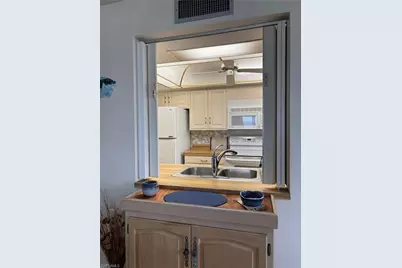 15 Bluebill Ave #1006, Naples, FL 34108 - Photo 12