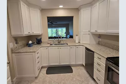 15400 Cedarwood Ln #102, Naples, FL 34110 - Photo 1