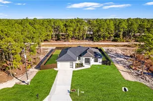 521 Allison St E, Lehigh Acres, FL 33974 - Photo 2