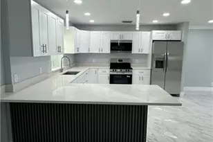 2101 43rd Terrace SW, Naples, FL 34116 - Photo 6