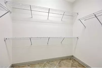 7655 Martino Cir, Naples, FL 34112 - Photo 16