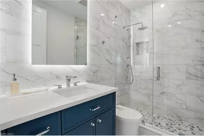 13455 Pond Apple Dr E, Naples, FL 34119 - Photo 32