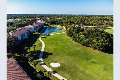 6945 Dennis Cir #I-107, Naples, FL 34104 - Photo 2