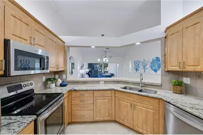 7087 Barrington Cir #202, Naples, FL 34108 - Photo 12